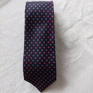 Tino Cosma Milano 100% silk necktie with a red and white dot pattern, 3"